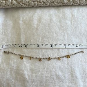 14k Gold “LOVE” bracelet with heart charms